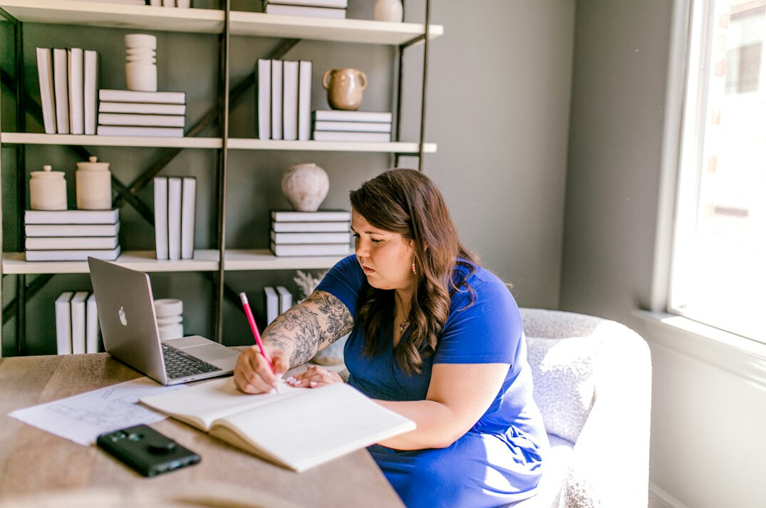 woman journaling at home